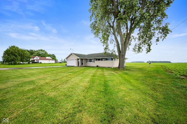 10500 S County Road 200 W, Muncie, IN 47302 - view of front of property with an attached garage, a front lawn, and a view of countryside