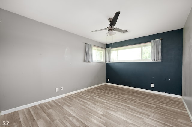 10500 S County Road 200 W, Muncie, IN 47302 - unfurnished room featuring wood finished floors and ceiling fan