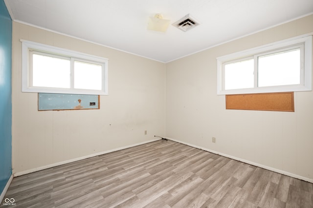10500 S County Road 200 W, Muncie, IN 47302 - unfurnished room with wood finished floors and ornamental molding