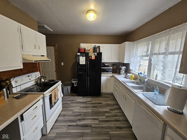 2824 Brown St, Anderson, IN 46016 - kitchen featuring white appliances, under cabinet range hood, white cabinetry, and light countertops