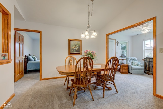 7911 Bentley Commons Dr, Indianapolis, IN 46259 - dining space featuring light colored carpet, a chandelier, lofted ceiling, and ceiling fan