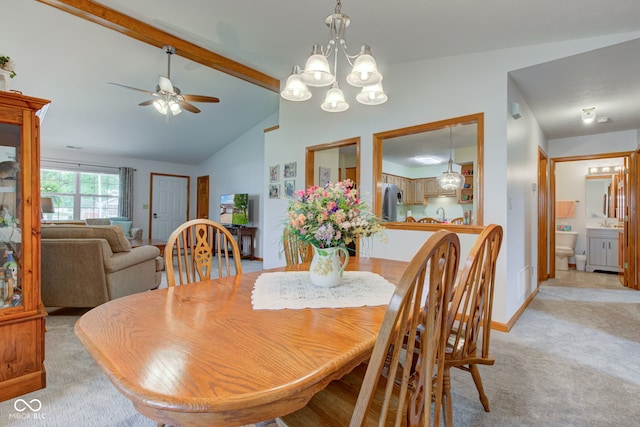 7911 Bentley Commons Dr, Indianapolis, IN 46259 - dining area featuring ceiling fan, light colored carpet, and a chandelier