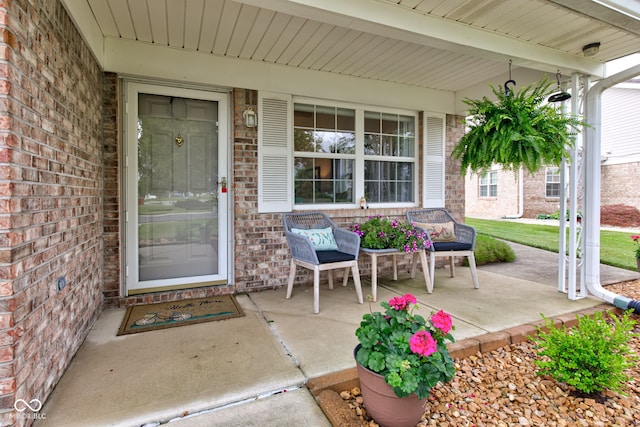 7911 Bentley Commons Dr, Indianapolis, IN 46259 - property entrance with covered porch and brick siding