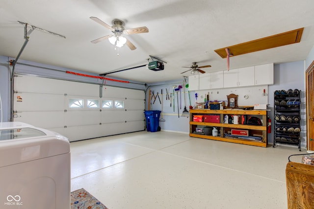 7911 Bentley Commons Dr, Indianapolis, IN 46259 - garage featuring a garage door opener, ceiling fan, and washer / clothes dryer