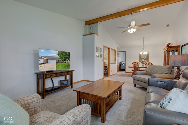 7911 Bentley Commons Dr, Indianapolis, IN 46259 - carpeted living room with a chandelier, beamed ceiling, a ceiling fan, and high vaulted ceiling