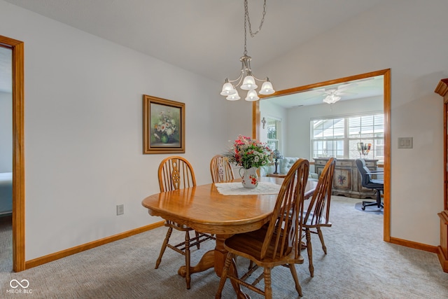7911 Bentley Commons Dr, Indianapolis, IN 46259 - dining room featuring light colored carpet, an office area, lofted ceiling, and a chandelier
