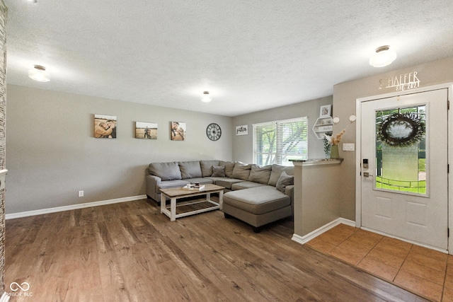9265 Brunson Run, Indianapolis, IN 46256 - living area with wood finished floors and a textured ceiling