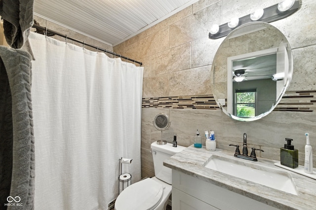 9265 Brunson Run, Indianapolis, IN 46256 - bathroom featuring tile walls, ceiling fan, vanity, tasteful backsplash, and curtained shower