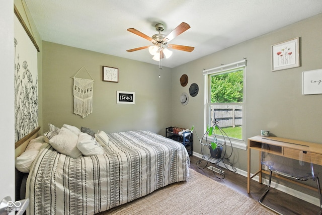 9265 Brunson Run, Indianapolis, IN 46256 - bedroom featuring wood finished floors and a ceiling fan