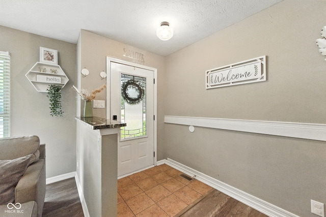 9265 Brunson Run, Indianapolis, IN 46256 - foyer featuring baseboards