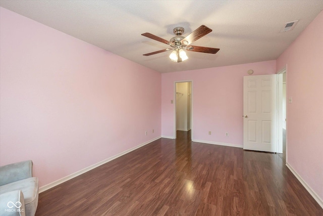 14523 Lee Stewart Ln, Fishers, IN 46038 - unfurnished bedroom featuring wood finished floors, a walk in closet, and ceiling fan