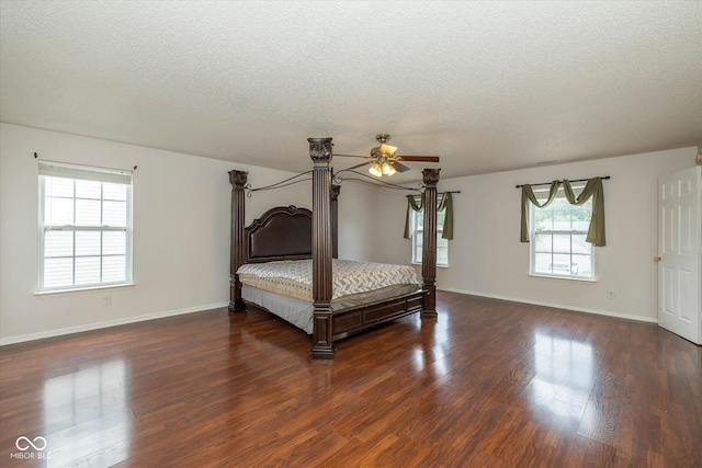 14523 Lee Stewart Ln, Fishers, IN 46038 - bedroom with dark wood-type flooring and a textured ceiling