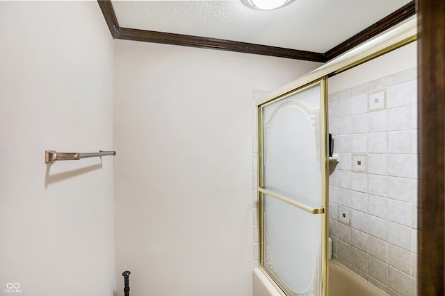 7165 W State Road 252nd Rd W, Edinburgh, IN 46124 - full bathroom featuring ornamental molding, shower / bath combination with glass door, a textured ceiling, and tile walls