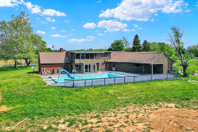 7165 W State Road 252nd Rd W, Edinburgh, IN 46124 - back of property featuring a balcony, a chimney, and a patio