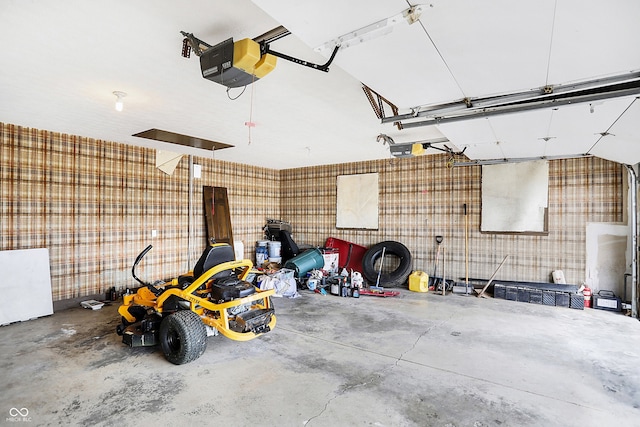 7165 W State Road 252nd Rd W, Edinburgh, IN 46124 - garage with wallpapered walls and a garage door opener