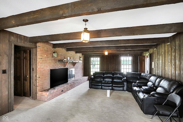 7165 W State Road 252nd Rd W, Edinburgh, IN 46124 - carpeted living area with beam ceiling, wood walls, and a brick fireplace