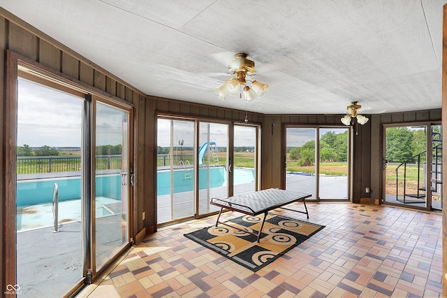 7165 W State Road 252nd Rd W, Edinburgh, IN 46124 - unfurnished sunroom with wooden walls