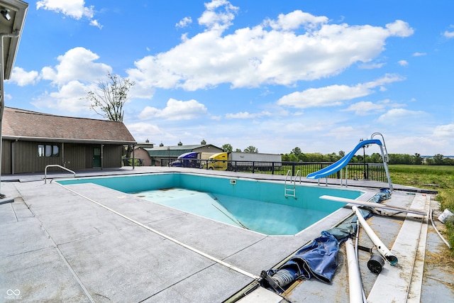 7165 W State Road 252nd Rd W, Edinburgh, IN 46124 - view of swimming pool with a water slide and a patio area