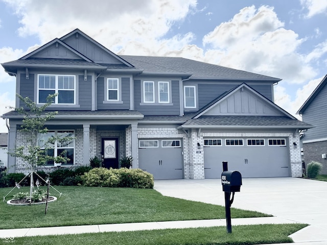 4281 Viewforth Ln, Bargersville, IN 46106 - craftsman inspired home with concrete driveway, board and batten siding, a front lawn, a shingled roof, and brick siding