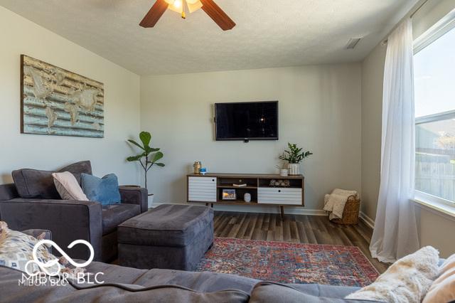 12584 Cold Stream Rd, Noblesville, IN 46060 - living area with wood finished floors and ceiling fan