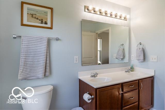 12584 Cold Stream Rd, Noblesville, IN 46060 - bathroom with double vanity and toilet