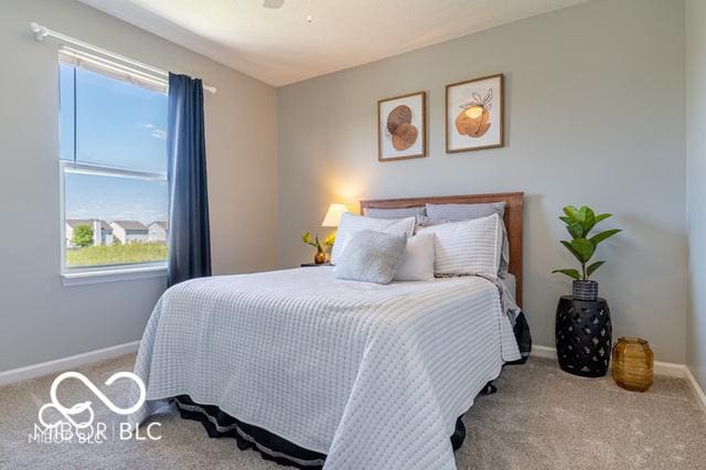 12584 Cold Stream Rd, Noblesville, IN 46060 - carpeted bedroom featuring baseboards and a ceiling fan