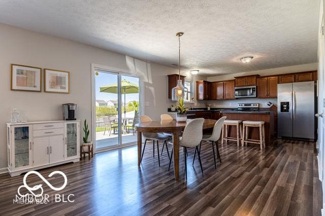 12584 Cold Stream Rd, Noblesville, IN 46060 - dining room with dark wood finished floors and a textured ceiling