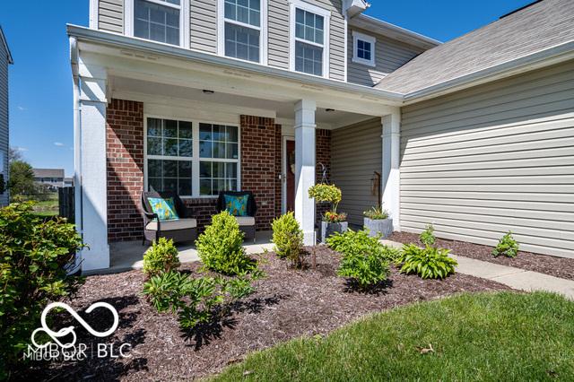 12584 Cold Stream Rd, Noblesville, IN 46060 - view of exterior entry with covered porch and brick siding