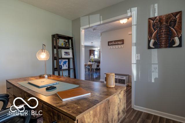 12584 Cold Stream Rd, Noblesville, IN 46060 - office space with dark wood-style floors and baseboards