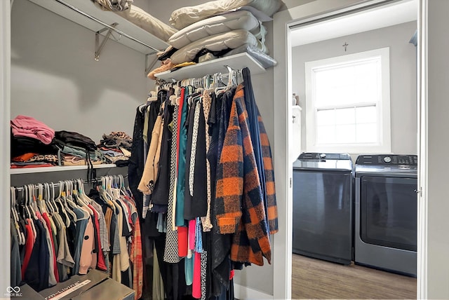 5386 W 1100, Fountaintown, IN 46130 - walk in closet featuring washing machine and dryer and wood finished floors