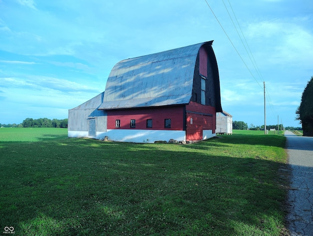 8955 N County Road 925 E, Seymour, IN 47274 - view of barn with a yard