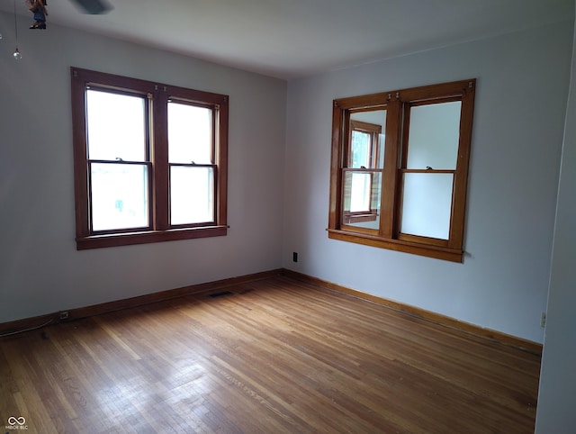 8955 N County Road 925 E, Seymour, IN 47274 - spare room featuring wood finished floors