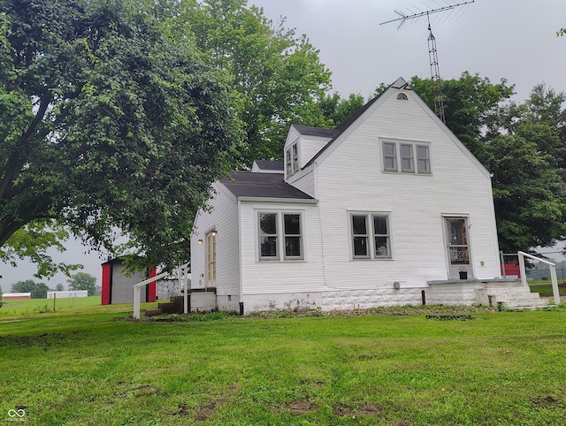 8955 N County Road 925 E, Seymour, IN 47274 - rear view of property with a yard