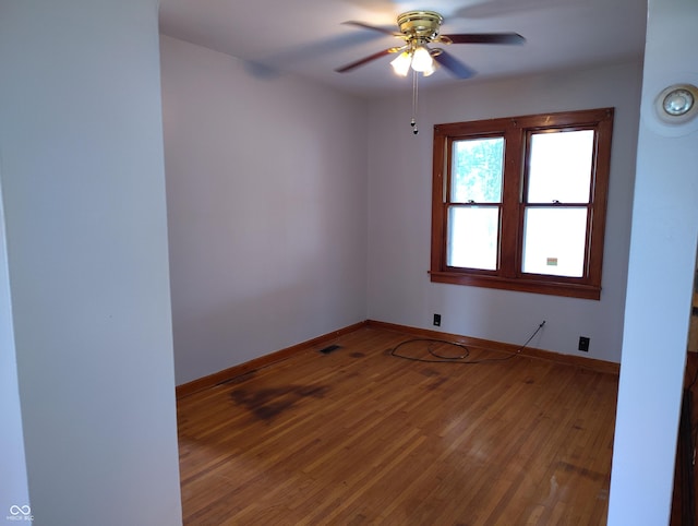 8955 N County Road 925 E, Seymour, IN 47274 - unfurnished room featuring wood finished floors and a ceiling fan
