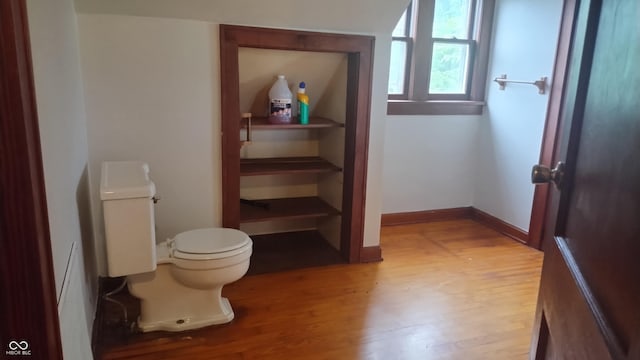 8955 N County Road 925 E, Seymour, IN 47274 - bathroom with toilet and wood finished floors
