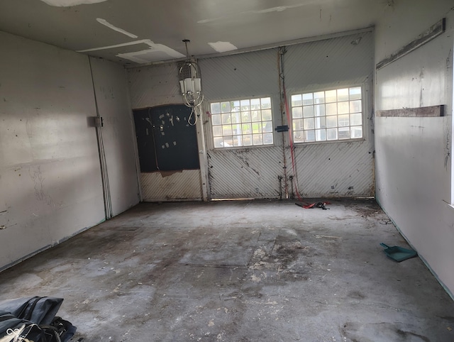 8955 N County Road 925 E, Seymour, IN 47274 - spare room featuring unfinished concrete floors