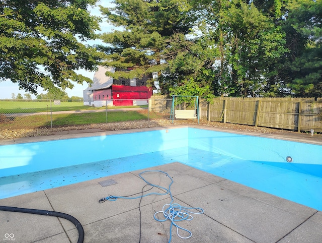 8955 N County Road 925 E, Seymour, IN 47274 - view of swimming pool featuring a fenced backyard