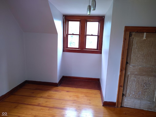 8955 N County Road 925 E, Seymour, IN 47274 - bonus room featuring hardwood / wood-style flooring and baseboards