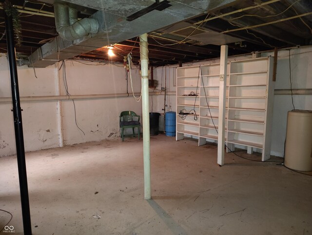 8955 N County Road 925 E, Seymour, IN 47274 - unfinished below grade area featuring a water pressure tank