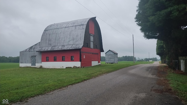 8955 N County Road 925 E, Seymour, IN 47274 - view of barn featuring a yard and driveway
