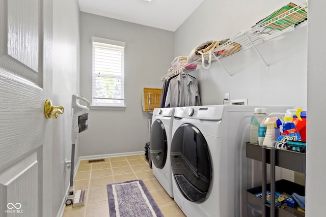 13624 Alston Dr, Fishers, IN 46037 - washroom featuring washing machine and clothes dryer and light tile patterned floors