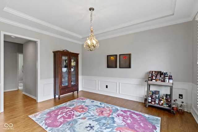 13624 Alston Dr, Fishers, IN 46037 - foyer entrance featuring wood finished floors, a chandelier, and crown molding