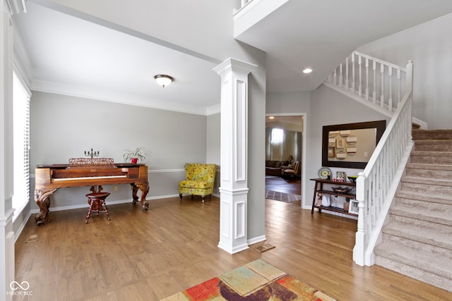 13624 Alston Dr, Fishers, IN 46037 - entryway featuring decorative columns, wood finished floors, stairway, recessed lighting, and ornamental molding