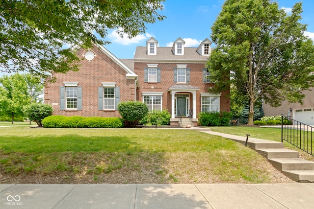 13624 Alston Dr, Fishers, IN 46037 - colonial house with brick siding and a front yard