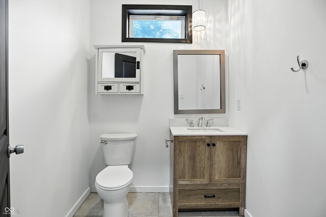 3210 Hovey St, Indianapolis, IN 46218 - half bath with vanity and tile patterned flooring