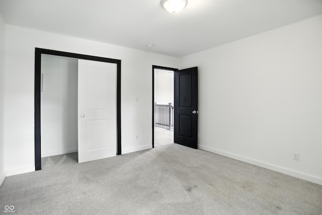 3210 Hovey St, Indianapolis, IN 46218 - unfurnished bedroom with carpet and a closet
