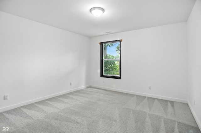 3210 Hovey St, Indianapolis, IN 46218 - unfurnished room with carpet floors and baseboards