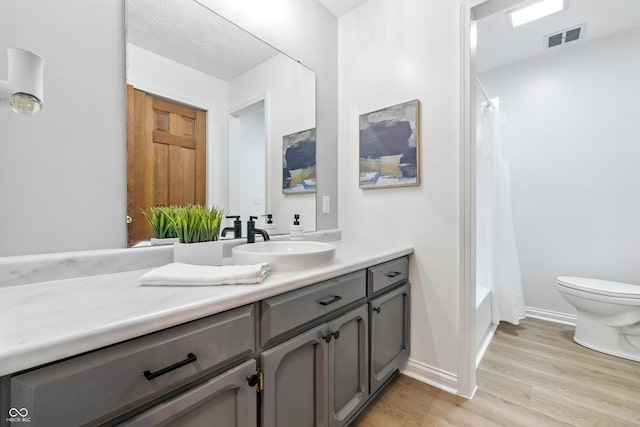 5982 Oak Hill E Dr, Plainfield, IN 46168 - full bath with vanity, wood finished floors, and shower / tub combo