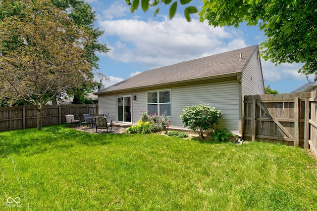 741 Chestnut Ln, Brownsburg, IN 46112 - rear view of property with a patio, a fenced backyard, and a shingled roof