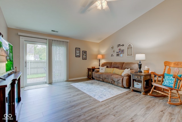 741 Chestnut Ln, Brownsburg, IN 46112 - living area with light wood-style flooring, a ceiling fan, and vaulted ceiling